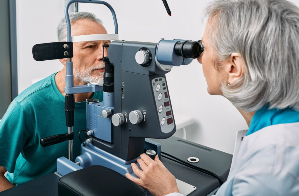 A man at the eye doctor having his eyes assessed for signs of glaucoma during a regular eye exam