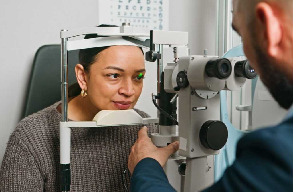 Patient undergoing a slit lamp examination during their routine eye exam.